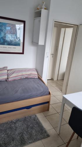 Ένα ή περισσότερα κρεβάτια σε δωμάτιο στο Kleine Auster