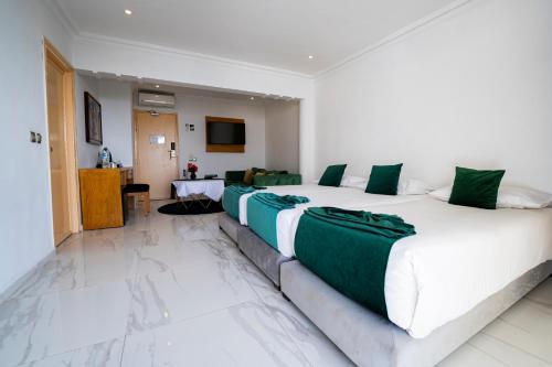 Cama o camas de una habitación en Hotel Argana Agadir