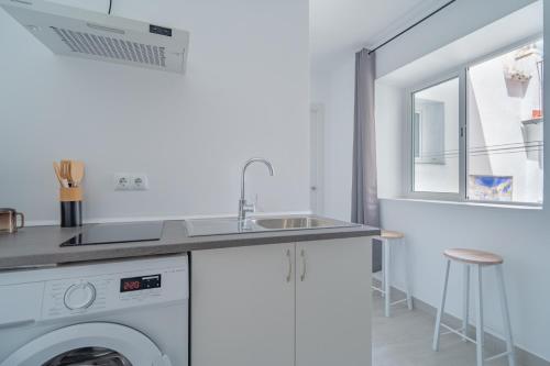 Kuchyň nebo kuchyňský kout v ubytování Ronda Vacation Homes