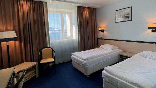 Lova arba lovos apgyvendinimo įstaigoje Hotel Barentsburg