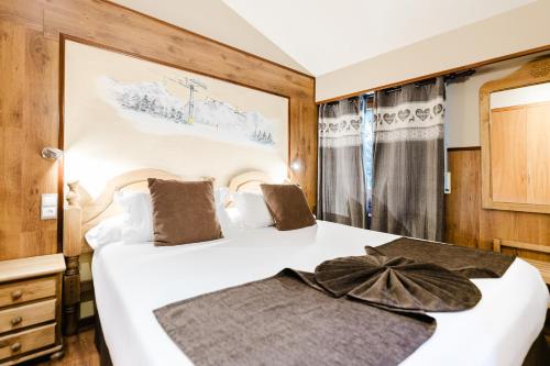 Cama o camas de una habitación en Apartaments La Neu