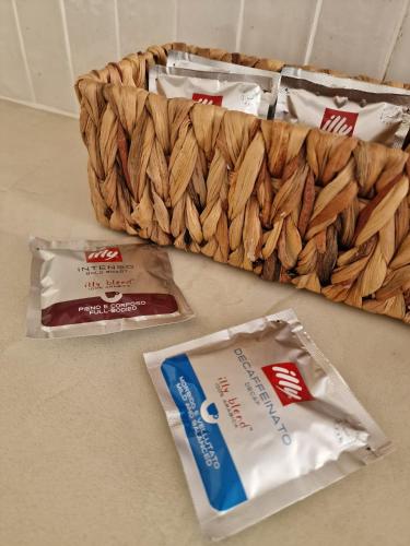 a basket of almonds and a bag of peanut butter at Apartment C-MM09 in Bussi sul Tirino