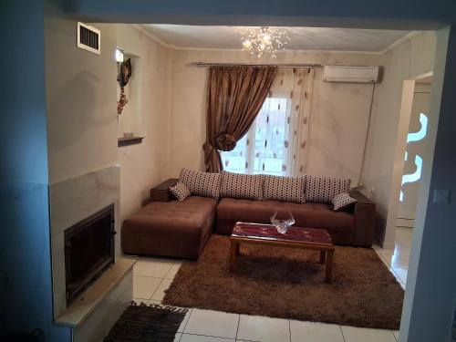 Zona de estar de Maisonette Stella