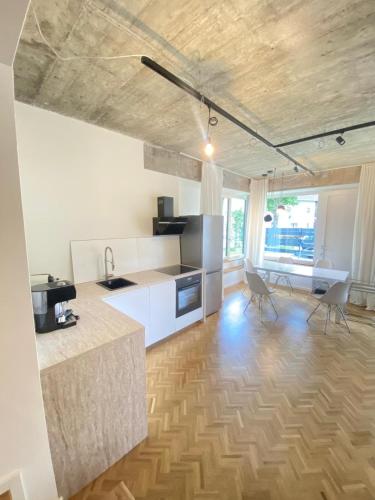 Η κουζίνα ή μικρή κουζίνα στο Design-Loft Messenähe - München Ost