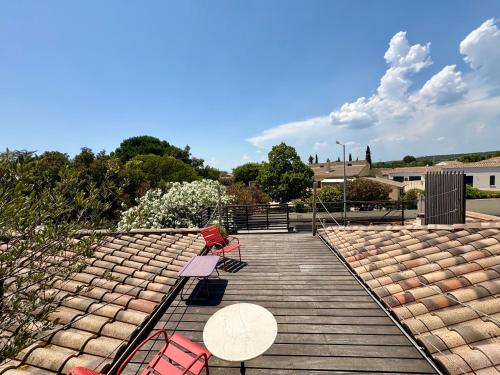 Balcon ou terrasse dans l'établissement Une adorable chambre SUR les toits