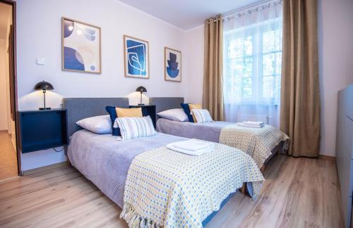 Apartamenty na Wyspie - Villa Park - Parking