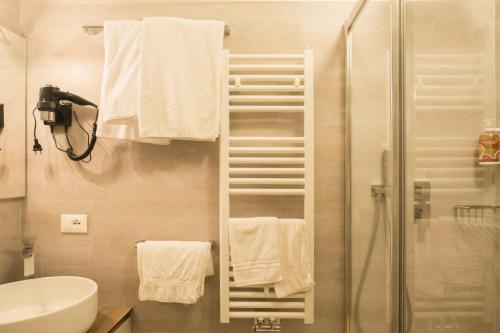 Koupelna v ubytování Hotel La Montanara Predazzo