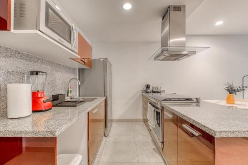Kuchyň nebo kuchyňský kout v ubytování Polanco Business & Leisure Hub