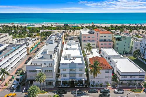 an aerial view of a city with buildings and the ocean at Chesterfield Hotel & Suites in Miami Beach