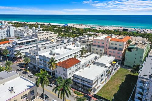 an aerial view of a city with buildings and the ocean at Chesterfield Hotel & Suites in Miami Beach