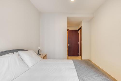 Postel nebo postele na pokoji v ubytování Polanco Business & Leisure Hub