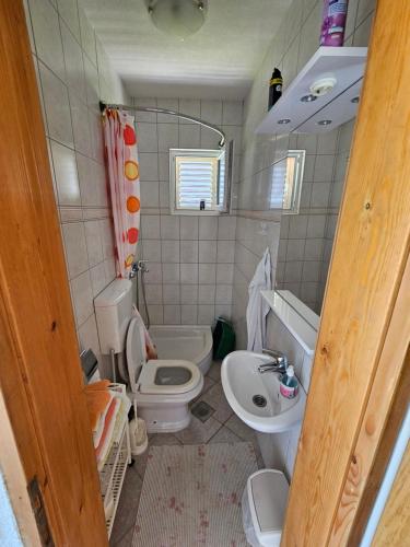 Ένα μπάνιο στο Apartments Alma