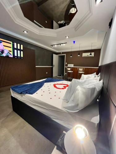 Katil atau katil-katil dalam bilik di Mais Motel e Hotel
