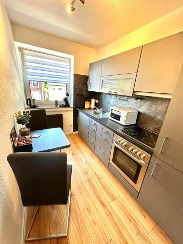 Dapur atau dapur kecil di Zentrale Studio Appartements Würselen