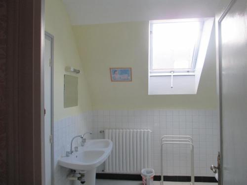 Ένα μπάνιο στο Appartements Tonton Jo