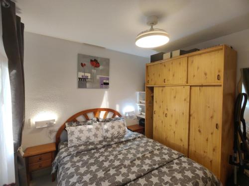 Ένα ή περισσότερα κρεβάτια σε δωμάτιο στο Estrella Del Mar, Denia