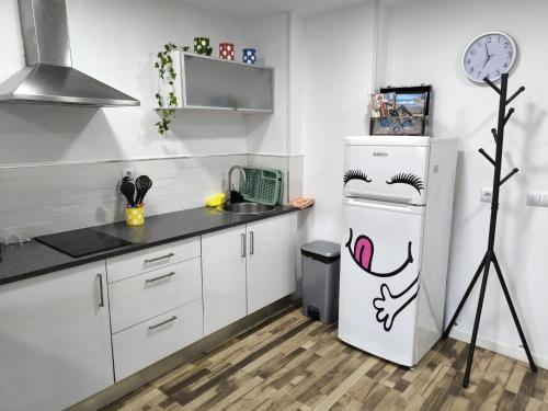 Kuchyňa alebo kuchynka v ubytovaní La Burbuja