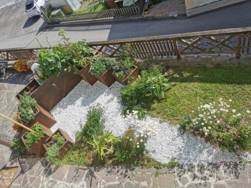 an overhead view of a garden with plants and flowers at Hotel Sonnblick in Kartitsch
