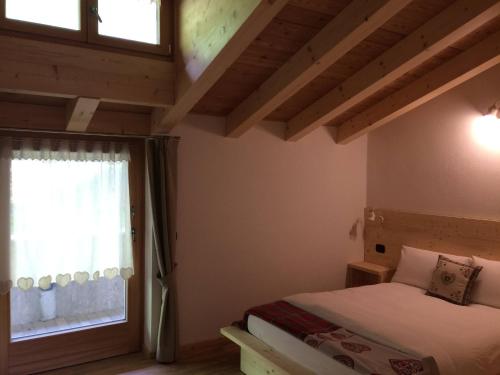 Krevet ili kreveti u jedinici u objektu Agritur Maso Ciprianna B&B