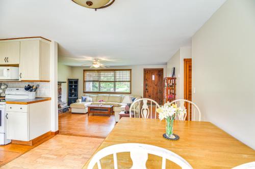 a kitchen and living room with a table and chairs at 6 Mi to Beach Family Home in Little Compton! in Little Compton