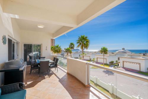 a balcony with a view of the ocean at Las Palmas 2BR 2BA Suite 2nd FL Ocean View- G205 in Campo del Medio