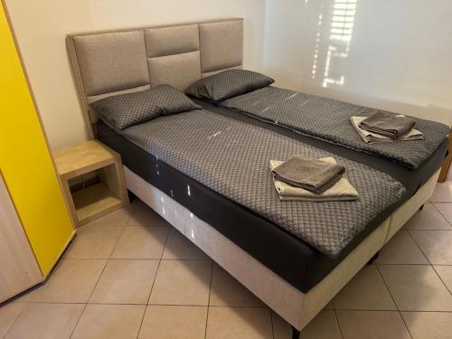 Ένα ή περισσότερα κρεβάτια σε δωμάτιο στο Tre terre apartment 2