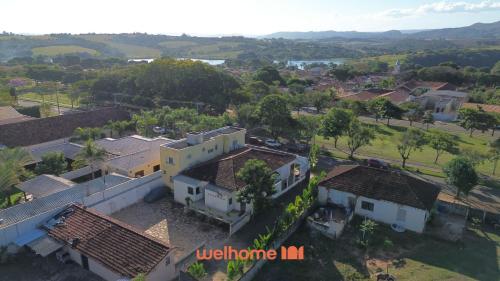 an aerial view of a small village with houses at Apartamento em Delfinopolis perto das Cachoeiras in Delfinópolis