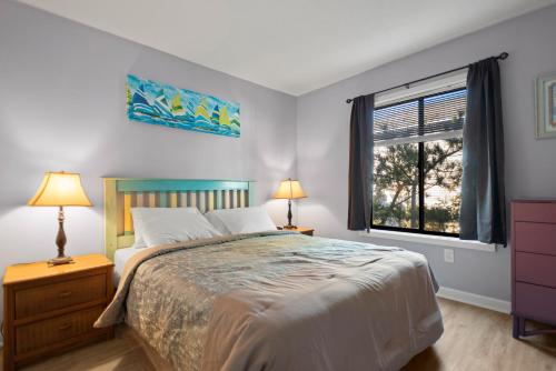 Postel nebo postele na pokoji v ubytování Beach Place