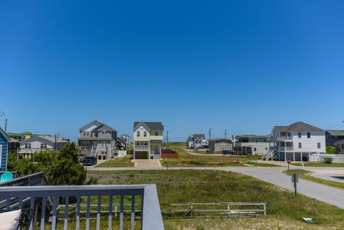 a view of a row of houses in a suburb at Blackbird Inn in Kill Devil Hills