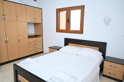 Postel nebo postele na pokoji v ubytování Hotel Marku