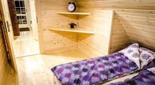 Postel nebo postele na pokoji v ubytování Sucholand