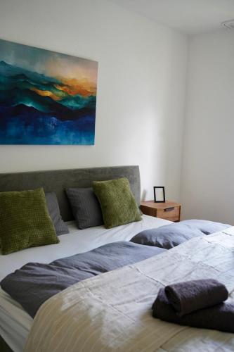 Кровать или кровати в номере PrimeBnb Osterkopf