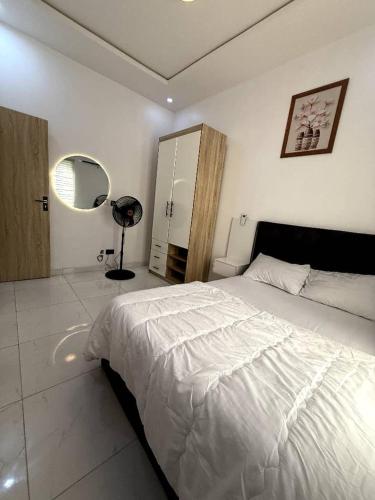 Ένα ή περισσότερα κρεβάτια σε δωμάτιο στο Four bedroom Luxury house Lekki