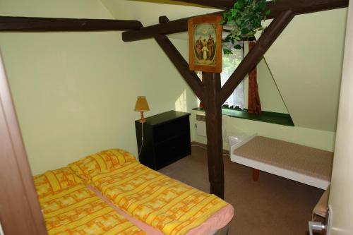 Postel nebo postele na pokoji v ubytování Holiday Home Ve Vlčicích
