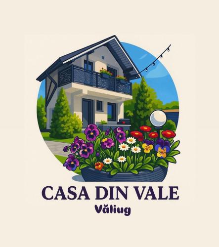 a picture of a house with flowers in front of it at Casa din Vale apartament - Valiug in Văliug
