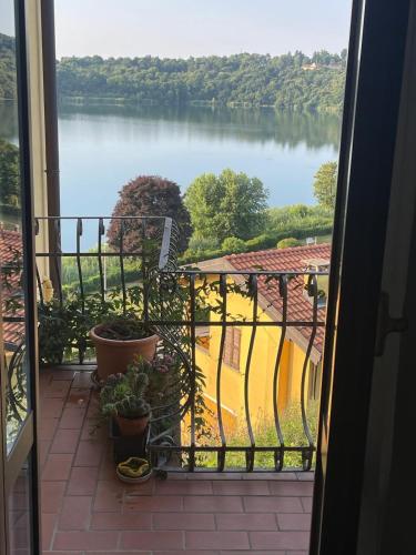a view of a view of a lake from a balcony at Il Boschetto - Vista Lago in Montorfano