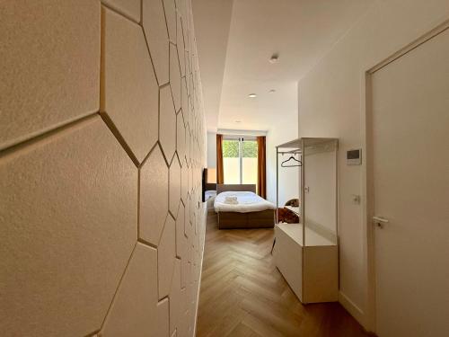 Postel nebo postele na pokoji v ubytování Sunshine Suites