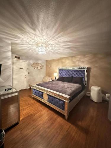 a bedroom with a large bed in a room at Red Lotus Inn in Milwaukee