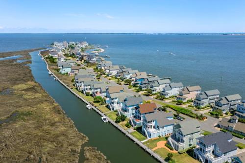 an aerial view of a harbor with houses at Duck Crossing in Manteo