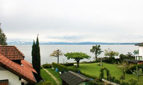 a view of the water from a house at Sommerhof Rauber in Immenstaad am Bodensee