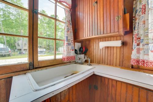 a kitchen with a sink and a window at Fish, Boat and Swim Cedarville Gem 6 with Dock Access in Cedarville