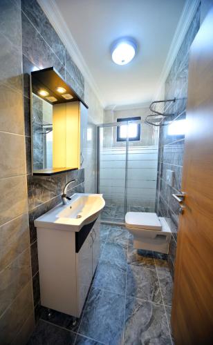 Ένα μπάνιο στο Asil Apart Hotel