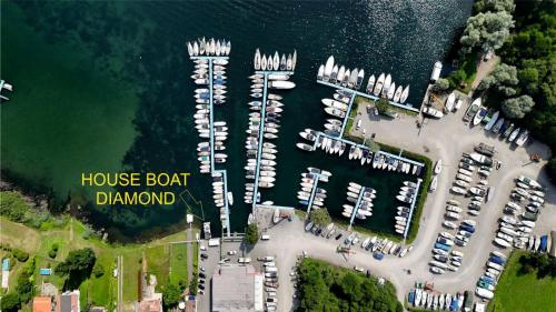 an aerial view of a marina with boats in the water at DIAMOND Bigigio House Boat in Lisanza