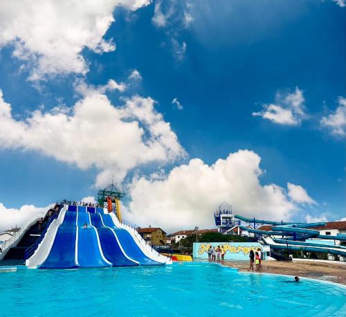 a water slide at a water park at GoldMar Beach Apartments - Praia da Vieira in Vieira de Leiria