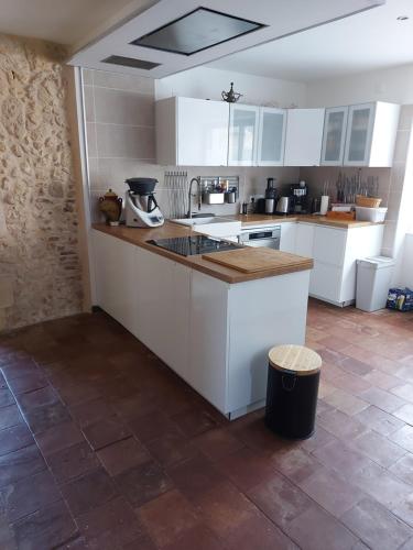 Kuchyň nebo kuchyňský kout v ubytování Maison de charme