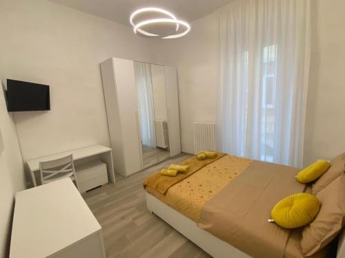 Postel nebo postele na pokoji v ubytování Nel cuore di Ascoli -casa vacanze