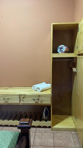 a wooden bunk bed in a room at Fergust Family Studio Monteverde in Sierra