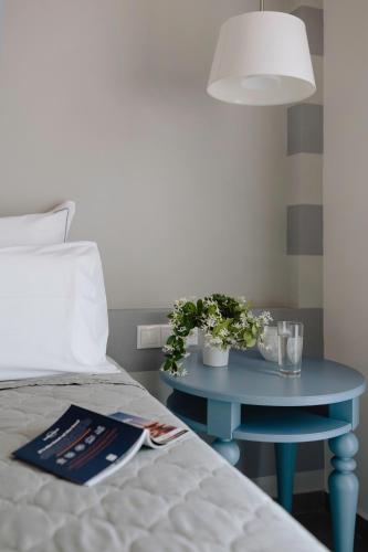 Katil atau katil-katil dalam bilik di Dimitra Boutique Hotel