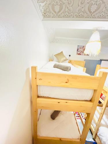 Cama o camas de una habitación en Moonlight Surf Hostel