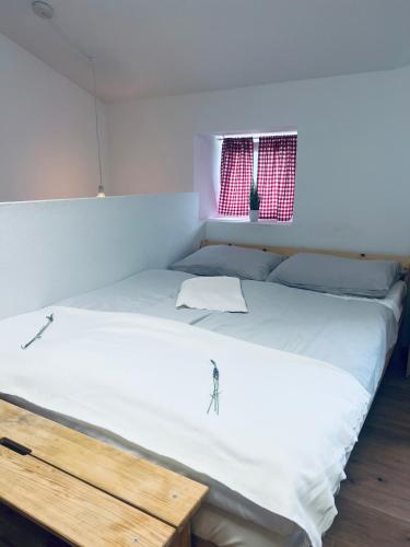 Postel nebo postele na pokoji v ubytování Hramišče, Botega